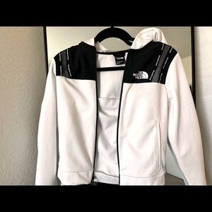 North Face jacket white/ black with tags attached.